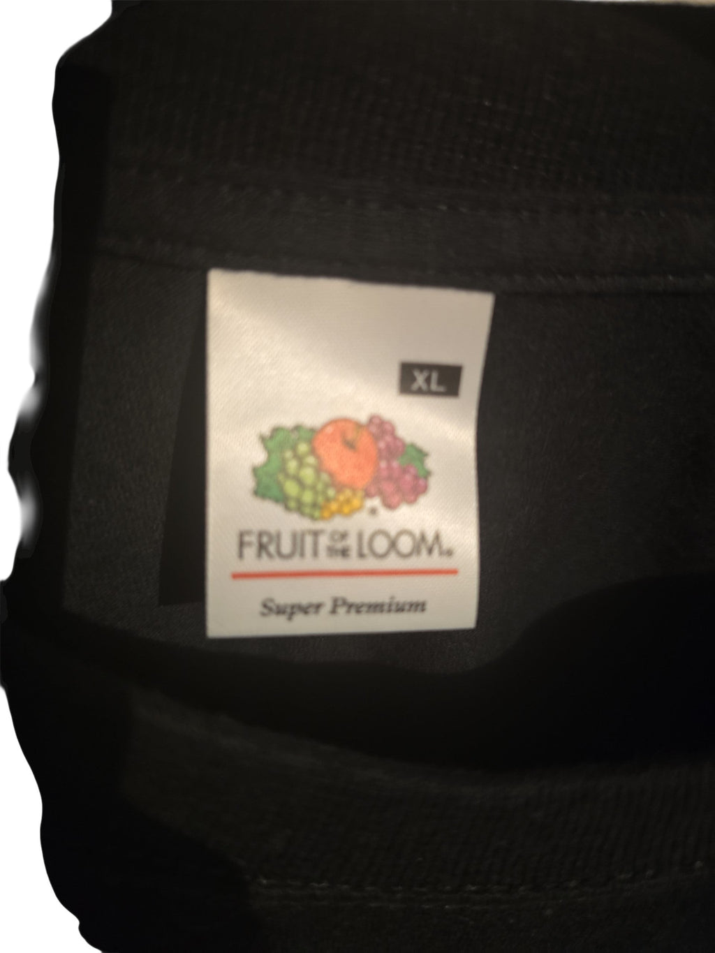 Etichetta interna Fruit of the Loom taglia XL su maglietta nera Ottoman Kumus in cotone